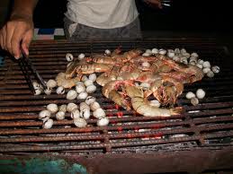 Grilling seafood. Cook seafood on a gas grill